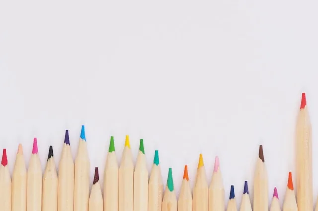 Paint and creative tools on a studio desk